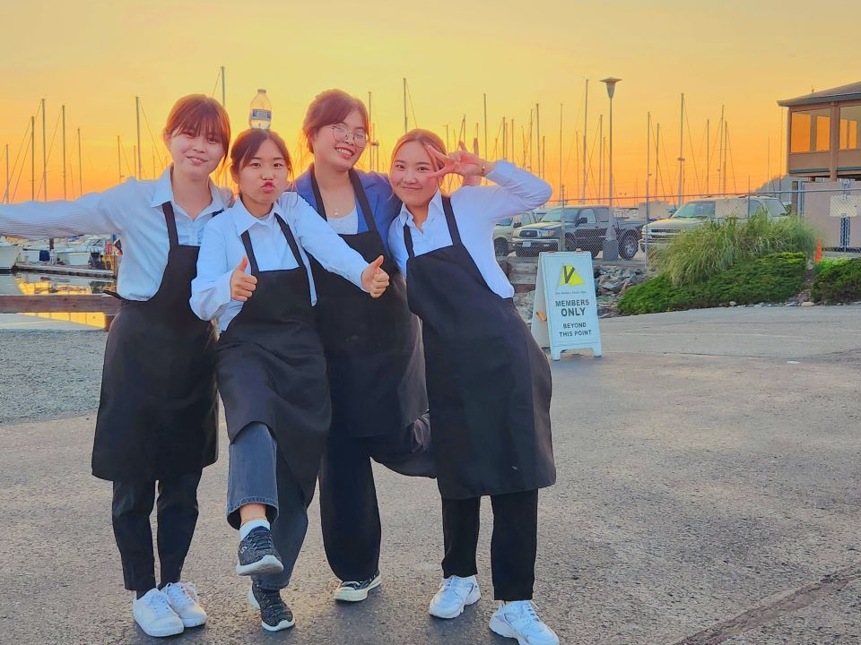 HOST students in a sunset