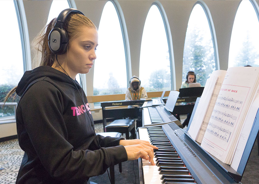 Music student at piano