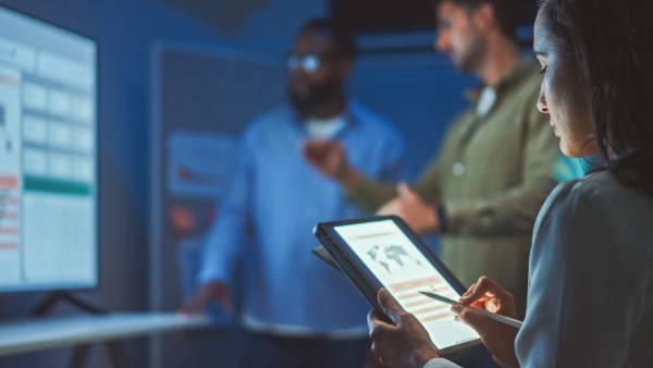 Student at work on tablet.