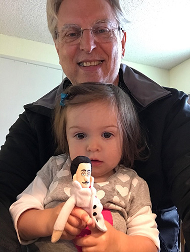 Dr. Frank Kline with granddaughter