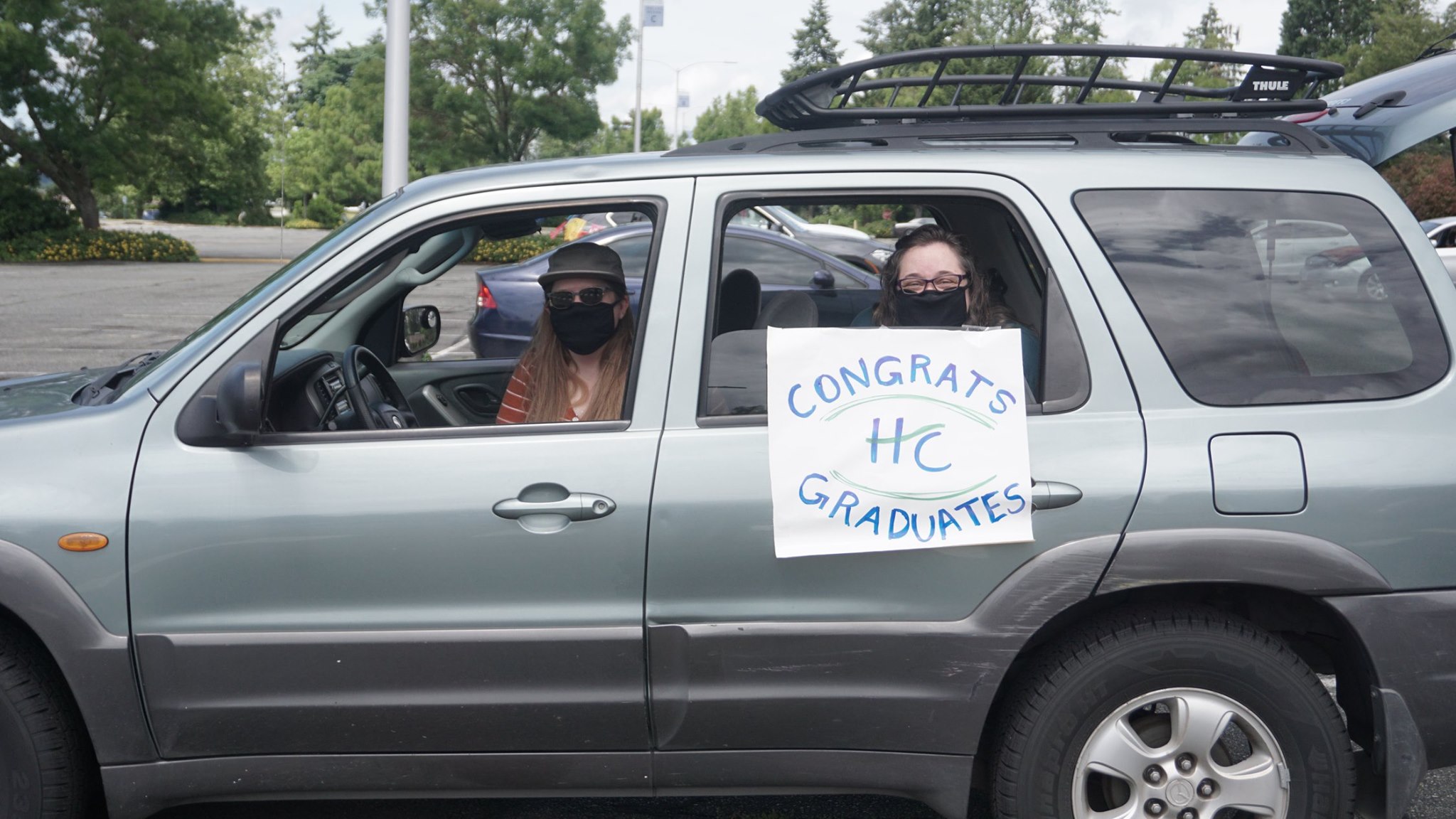 Highline College faculty and staff congratulate graduates during the Diploma Cover Drive-Thru on June 11.